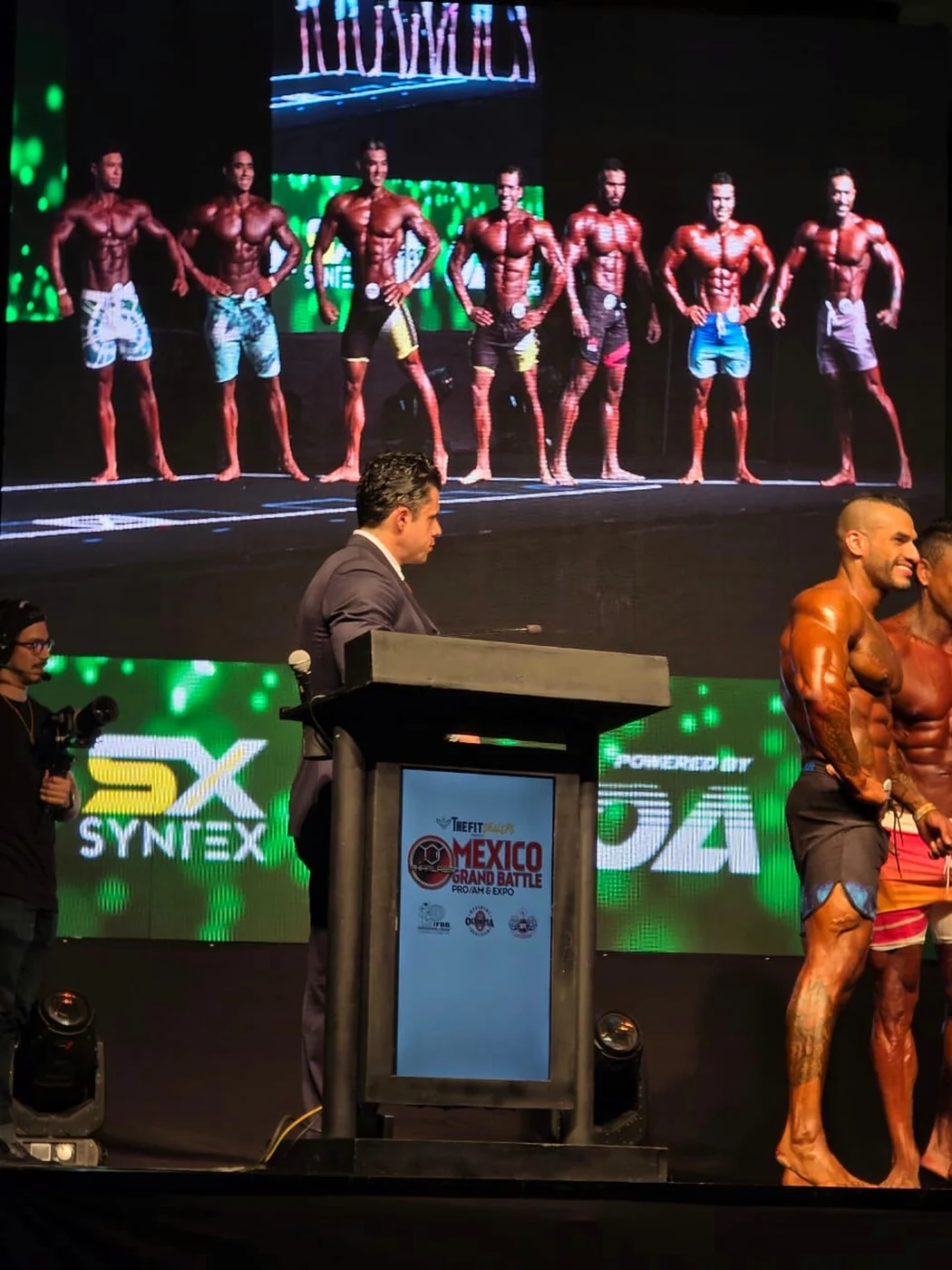 Full category line-up on stage with the Syntex podium